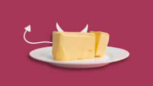 Butter on a plate representing dietary fat to avoid when trying to conceive