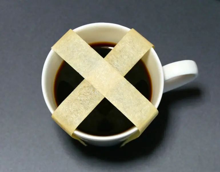 Coffee Cup With X Over Glass