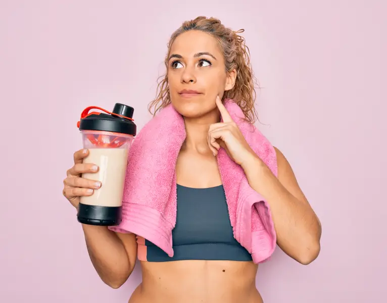 Sporty woman thinking about the best exercise for PCOS
