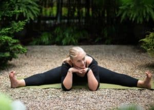 Fertility yoga pose wide leg forward fold